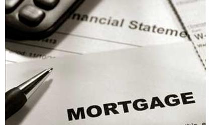 Governor Signs Bill Cutting Mortgage Fees
